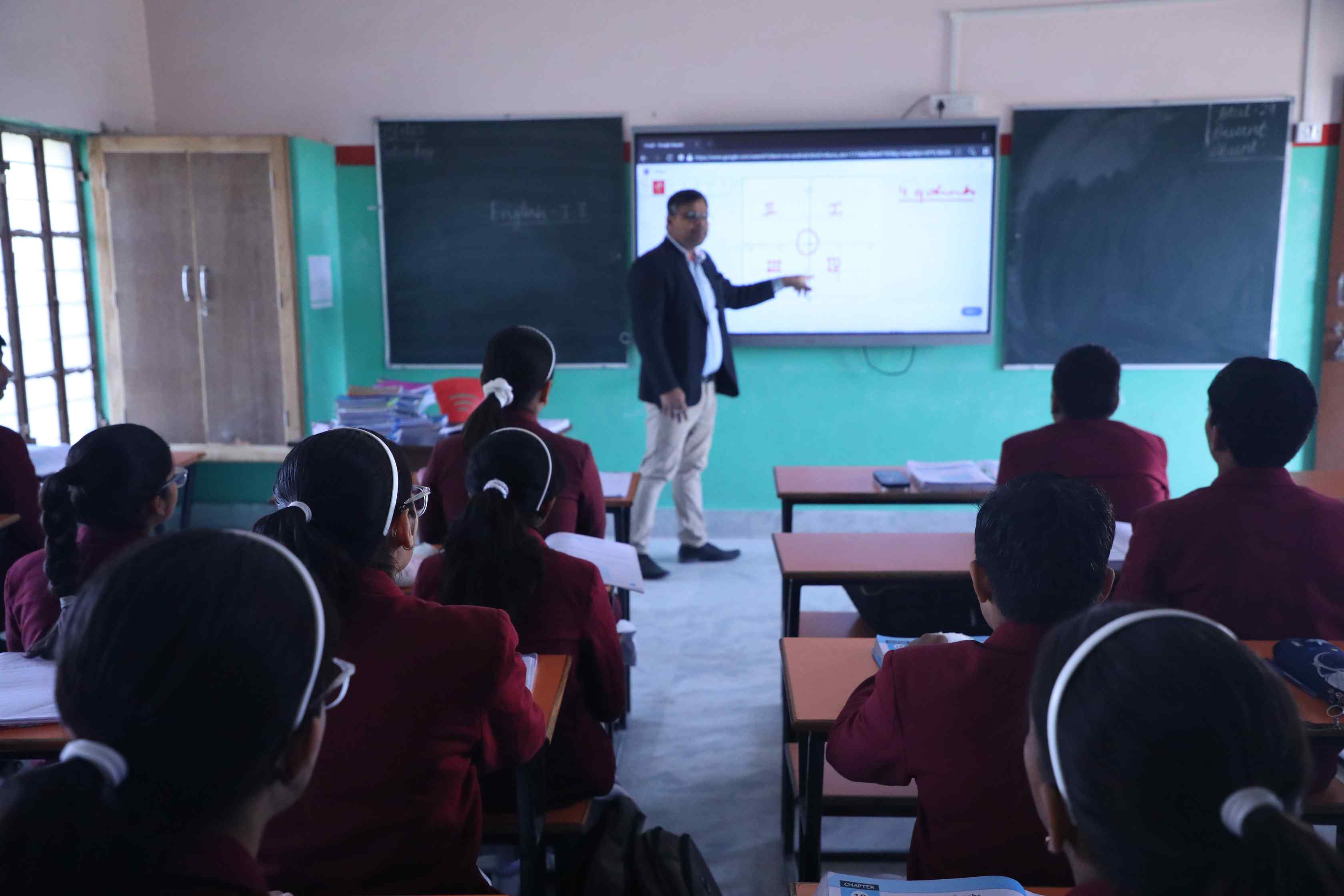 Spacious, well-lit classroom with students